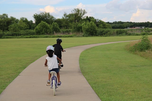 children on bike | karnas law firm