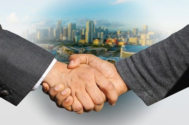 shaking hands | karnas law firm